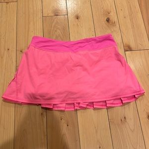 Woman’s neon pink lululemon skirt size 8